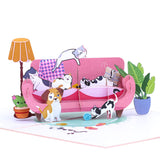 Dog and Cats playing on the couch Pop-Up Card