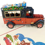 Santa Delivering Presents in Red Car 3D Pop Up Christmas Card UK