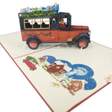 Santa Delivering Presents in Red Car 3D Pop Up Christmas Card UK